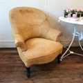 French vintage tub chair with black cabriolet beechwood legs. C1900. Ready to be reupholstered sold at a very good sale price!(&pound;150.00)